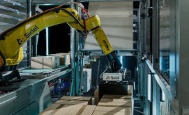 Image of palletizing unit combining robotics and cobotics